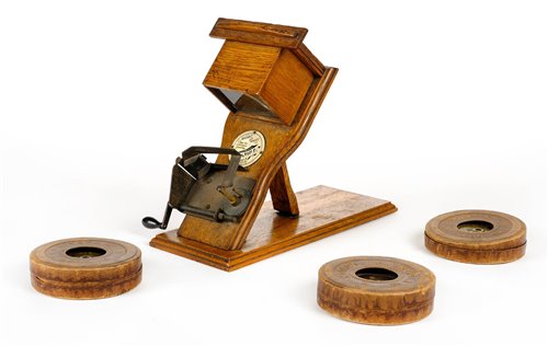 Lot 186 - Kinora of London flicker book viewer.
