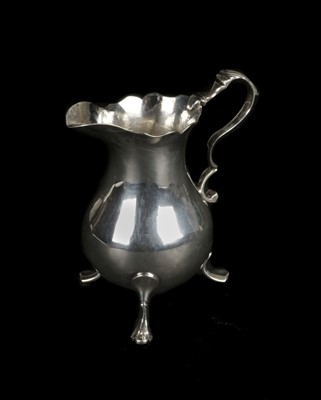 Lot 115 - Creamer. A George II silver creamer by Walter Brind, London 1759
