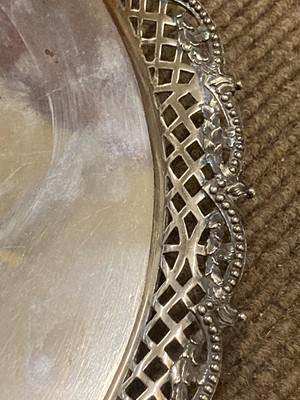 Lot 5 - Salver. A George II silver salver by Lewis Herne and Francis Butty, London 1757