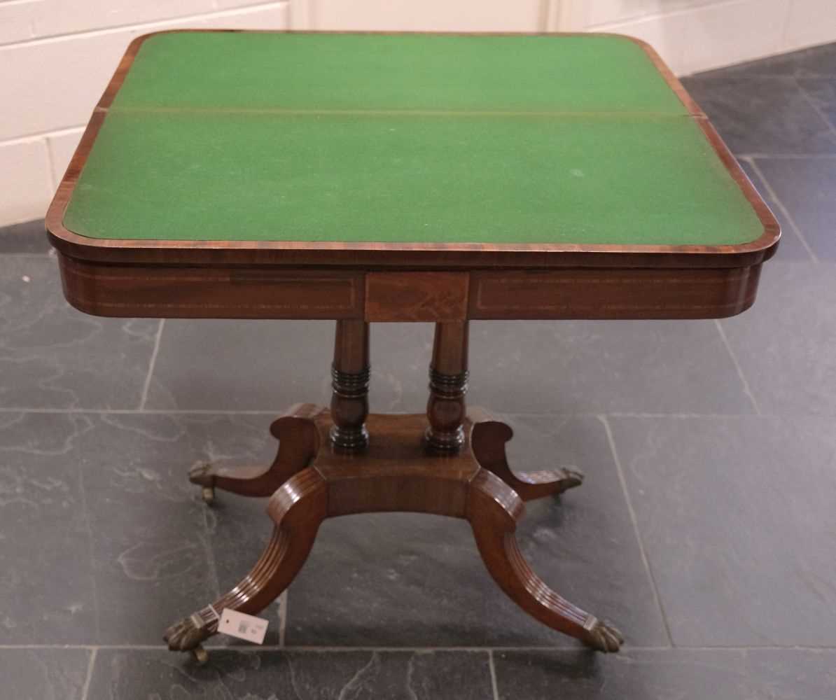 Lot 93 - Card Table. A Regency mahogany fold-over card table