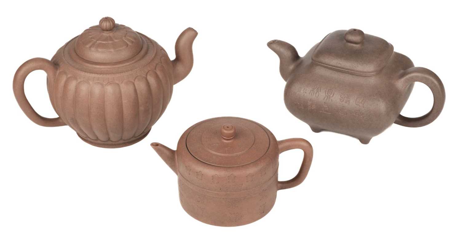 Lot 44 - Yixing Ware. Three 20th century Chinese Yixing zisha teapots