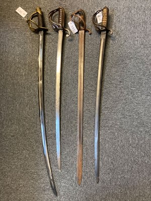 Lot 385 - Swords. A 19th century American cavalry sword and three other swords
