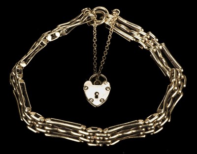 Lot 468 - Bangle. 9ct gold bangle, set with 5 topaz stones