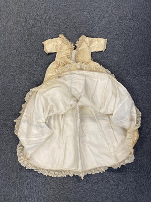 Lot 332 - Clothing. A silk christening gown, Steinmann & Co., Piccadilly, London, circa 1900