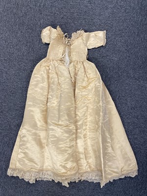 Lot 332 - Clothing. A silk christening gown, Steinmann & Co., Piccadilly, London, circa 1900