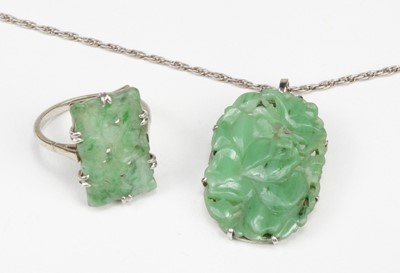 Lot 795 - Chinese Jade. An 18ct white gold and platinum ring and pendant