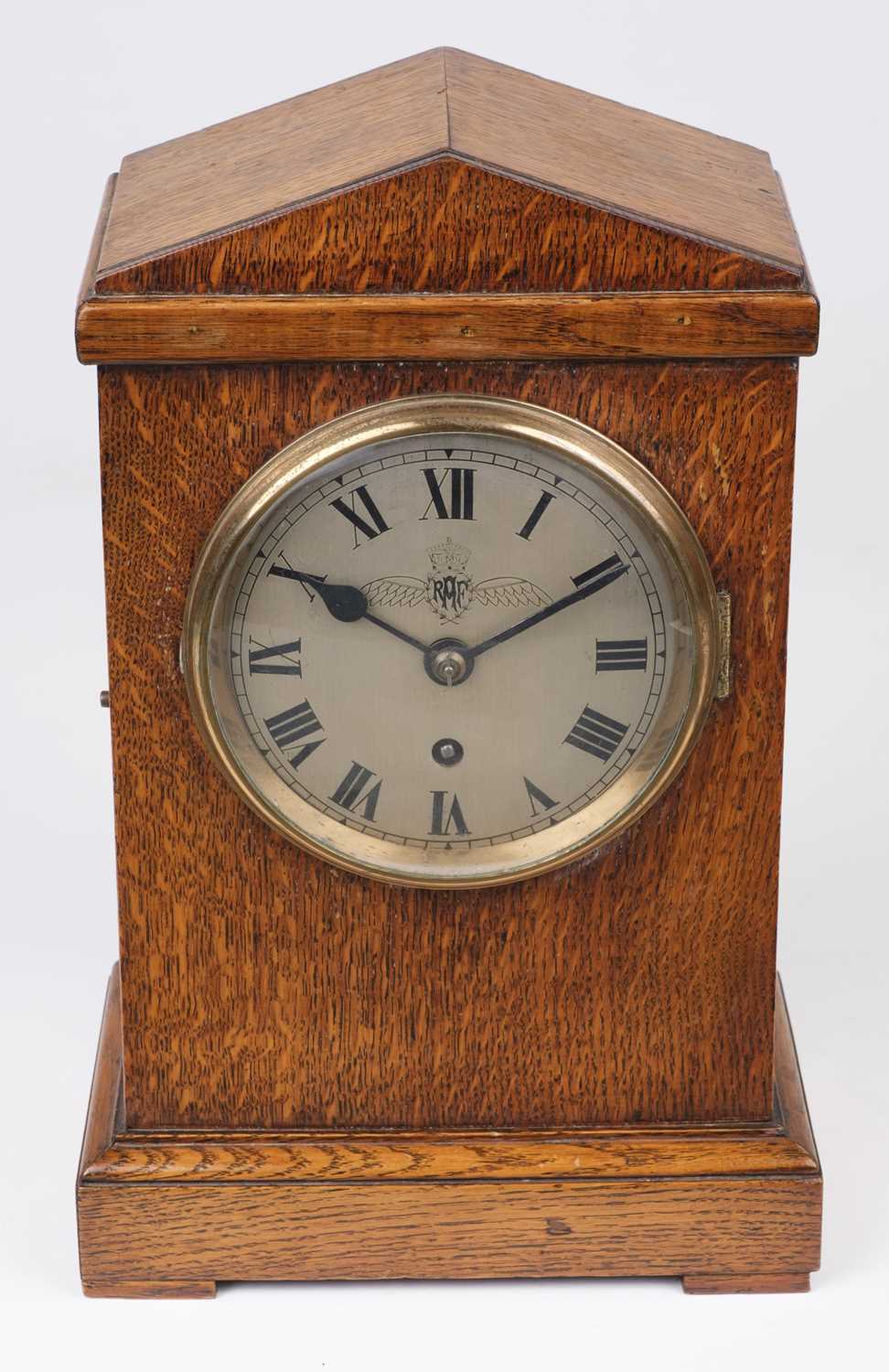 Lot 458 - Royal Air Force. A WWII RAF officer's mess oak mantel clock