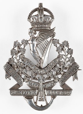 Lot 439 - King's Liverpool Regiment. A WWII silver officer's cap badge of the 8th (Irish) Battalion