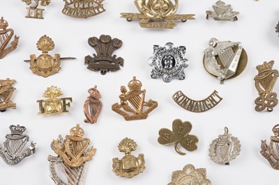 Lot 433 - Irish badges. A mixed collection of Victorian and later Irish regimental cap badges