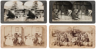 Lot 160 - Stereoscopic Treasury. A domed wooden box with viewer, plus stereoviews